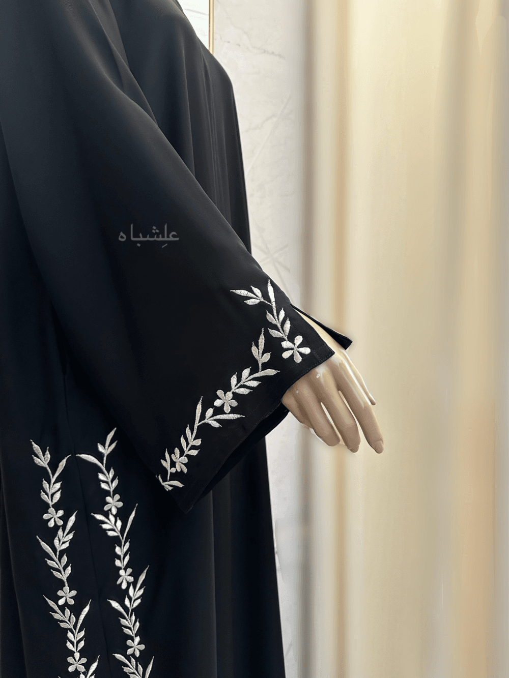 Abaya featuring premium Nida fabric with intricate floral embroidery woven with zari thread, complemented by a luxurious khimar made of Almas fabric. The Alishbah Salafi Khimar Abaya blends timeless elegance with contemporary design, offering sophistication and grace.