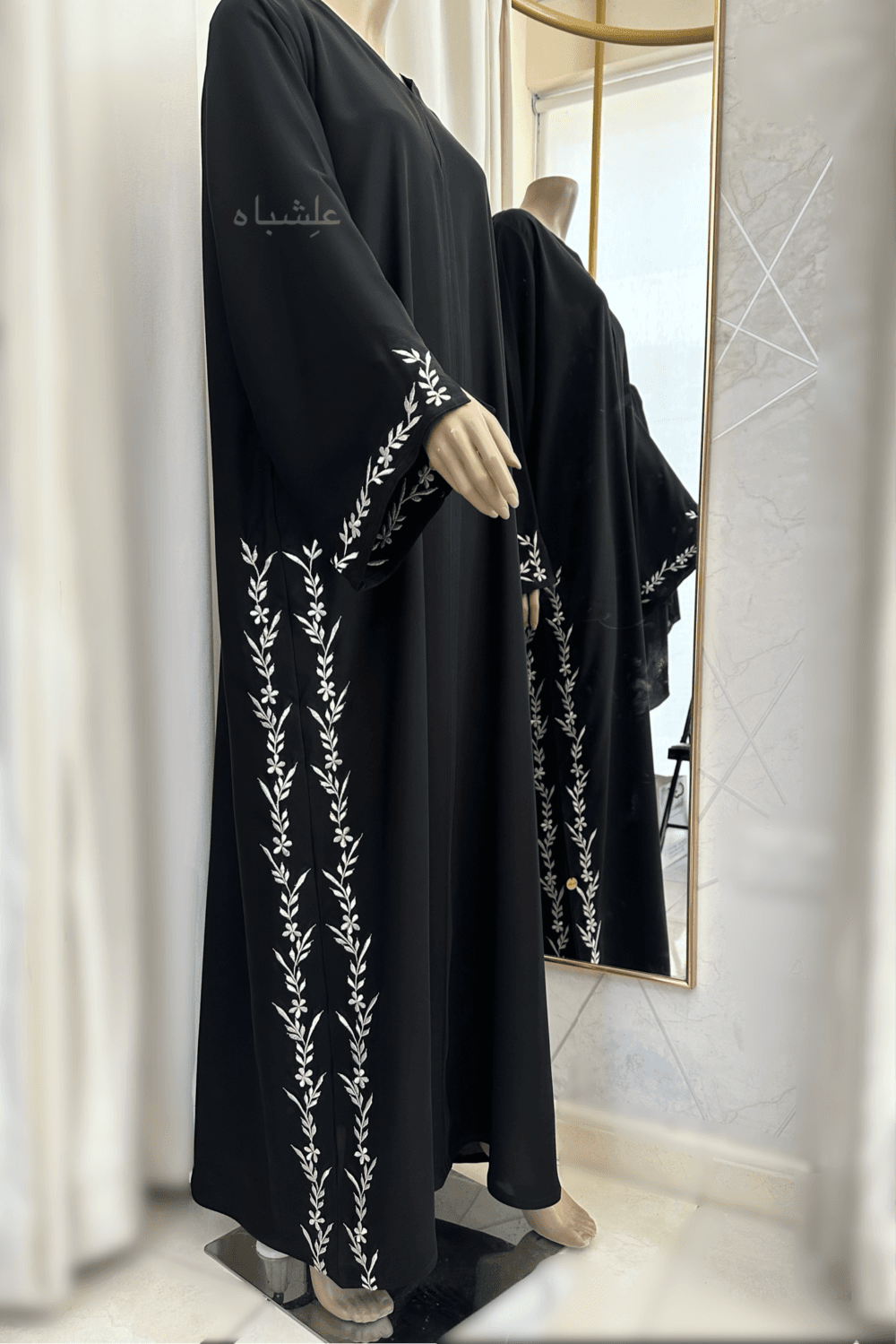 Abaya featuring premium Nida fabric with intricate floral embroidery woven with zari thread, complemented by a luxurious khimar made of Almas fabric. The Alishbah Salafi Khimar Abaya blends timeless elegance with contemporary design, offering sophistication and grace.