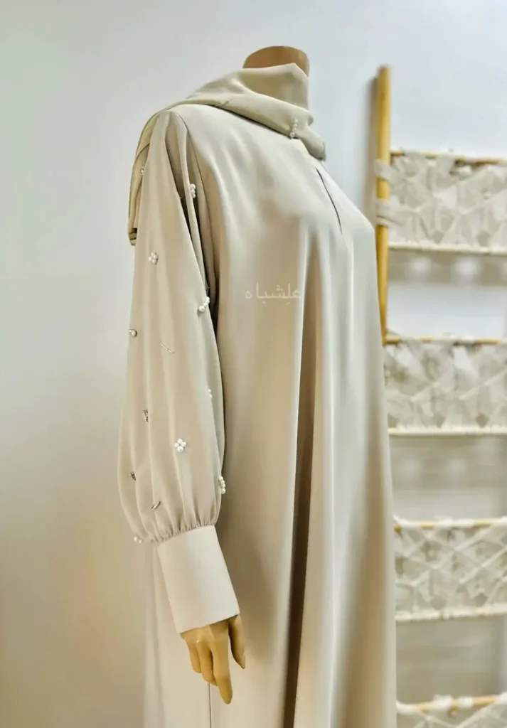 Side view of cream color Nida Abaya