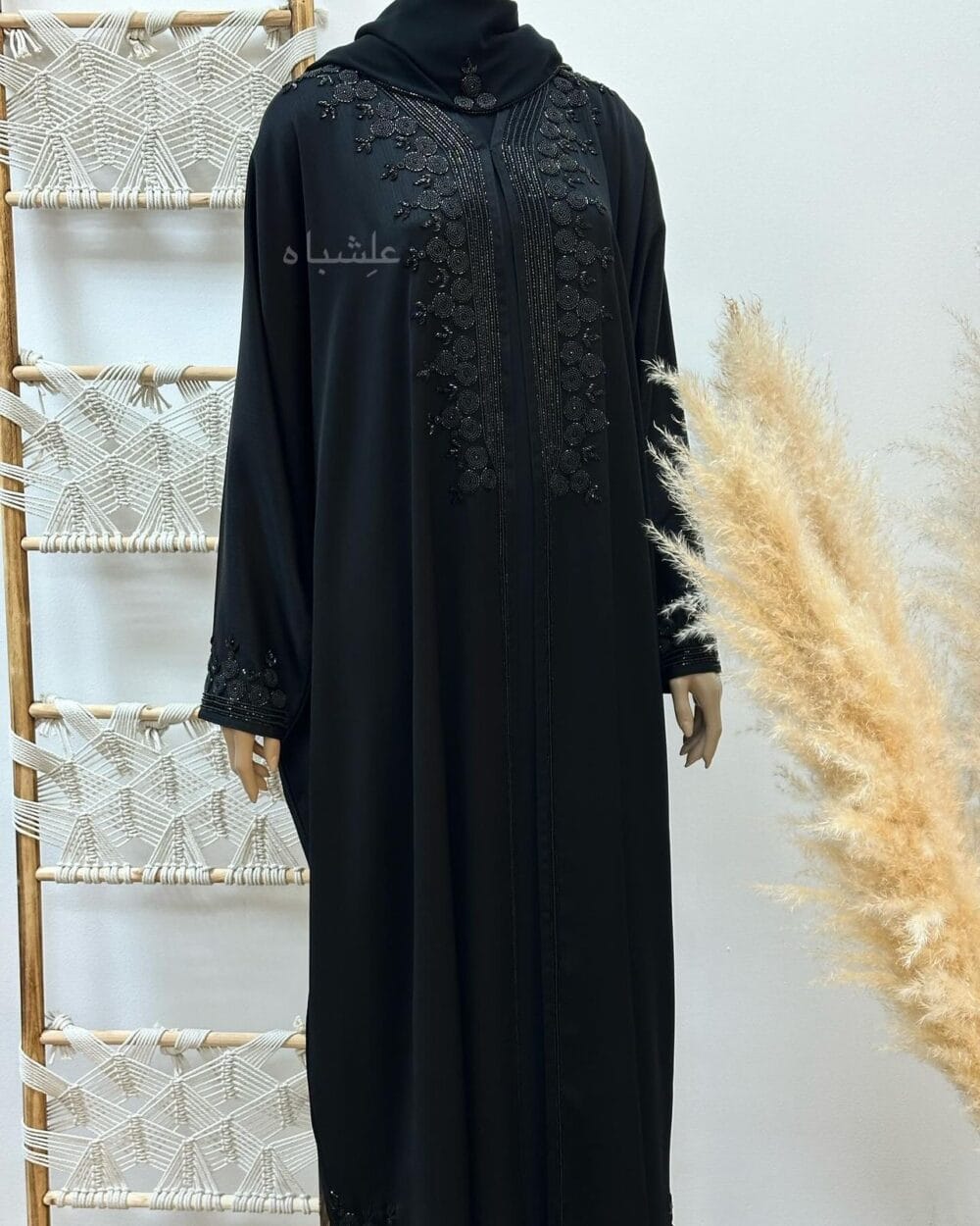 "Close-up of Tranquil Elegance Abaya from Alishbah, showcasing delicate handwork on Zoom New fabric."