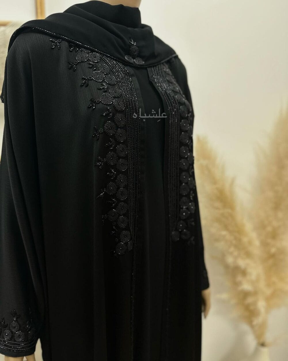 "Close-up of Tranquil Elegance Abaya from Alishbah, showcasing delicate handwork on Zoom New fabric."