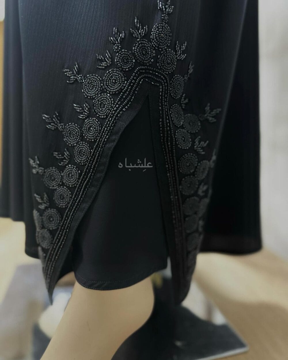 "Close-up of Tranquil Elegance Abaya from Alishbah, showcasing delicate handwork on Zoom New fabric."