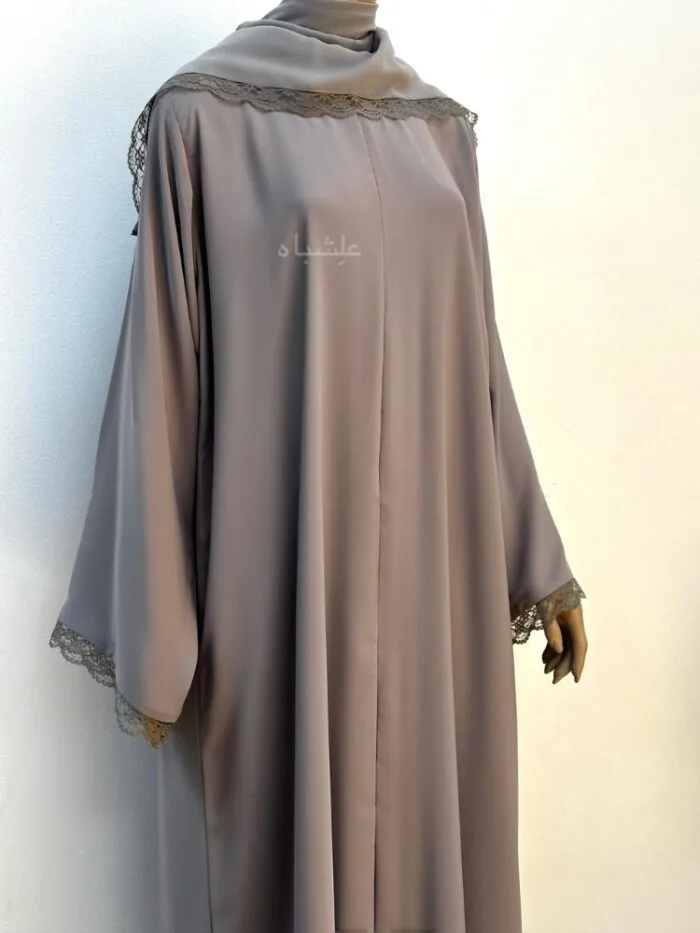 "Front view of the Lace Whisper Abaya with matching Sheila, featuring lace-trimmed sleeves and soft chiffon fabric."