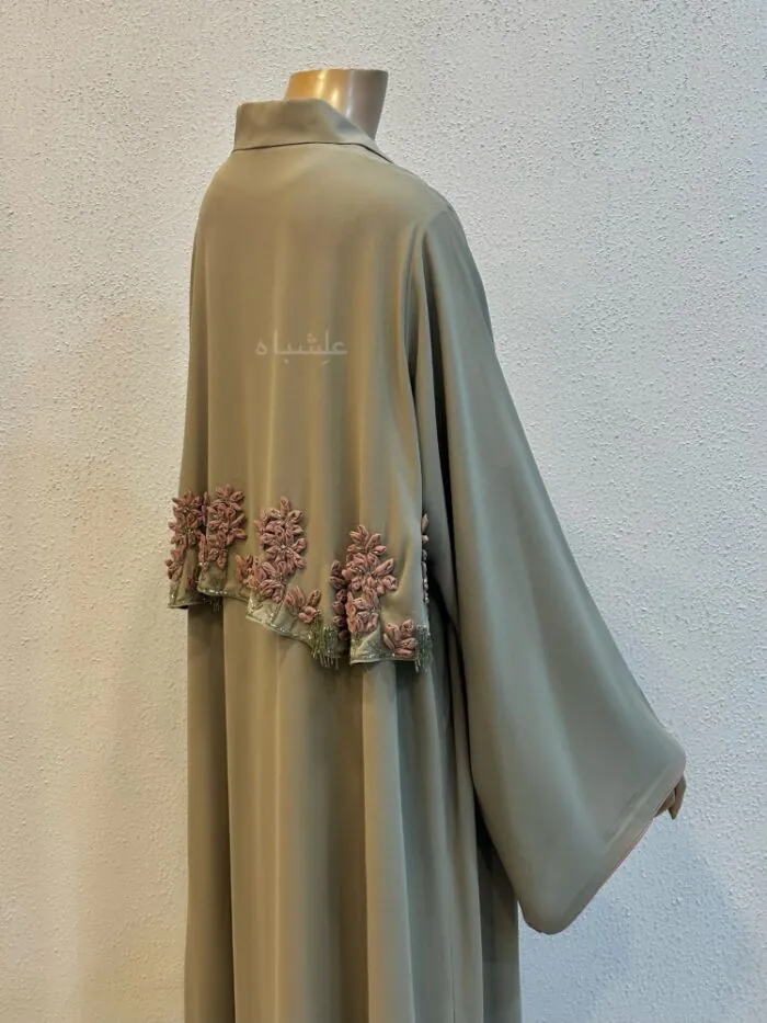 Back view of abaya showcasing the flower embroidery