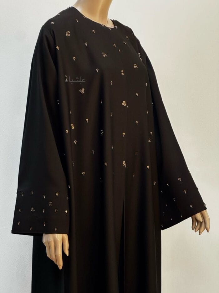 Front close-up view of abaya without sheila showing the handwork on sleeves and top