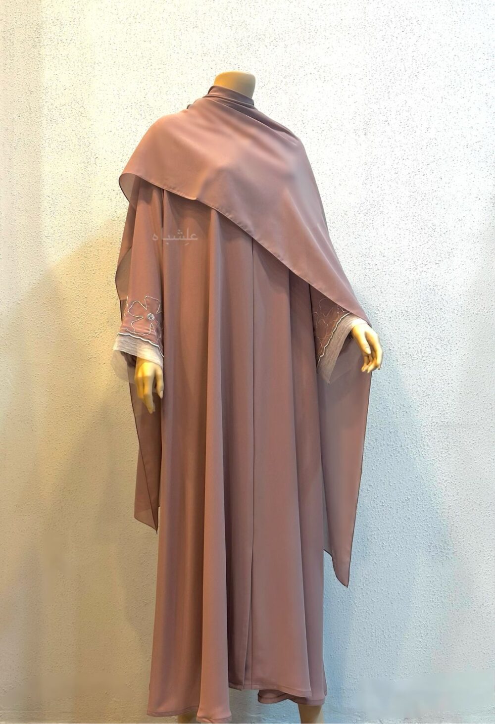 Front view of abaya with sheila spread all over