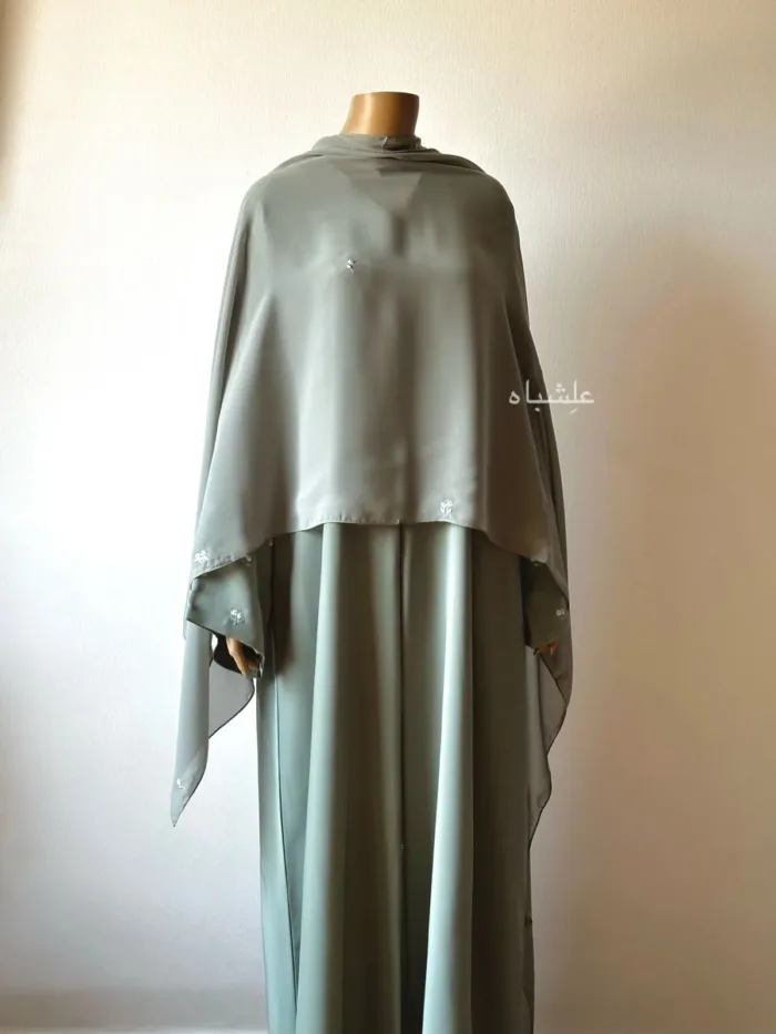 Front view of abaya with sheila spread all over