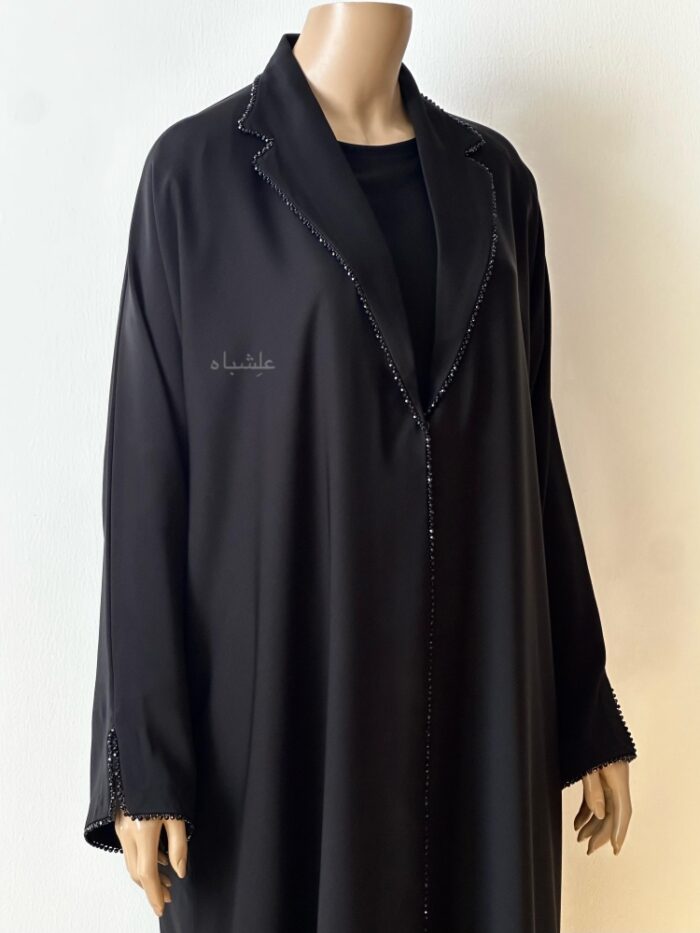 Close up view abaya without sheila showing the lace work around the collar