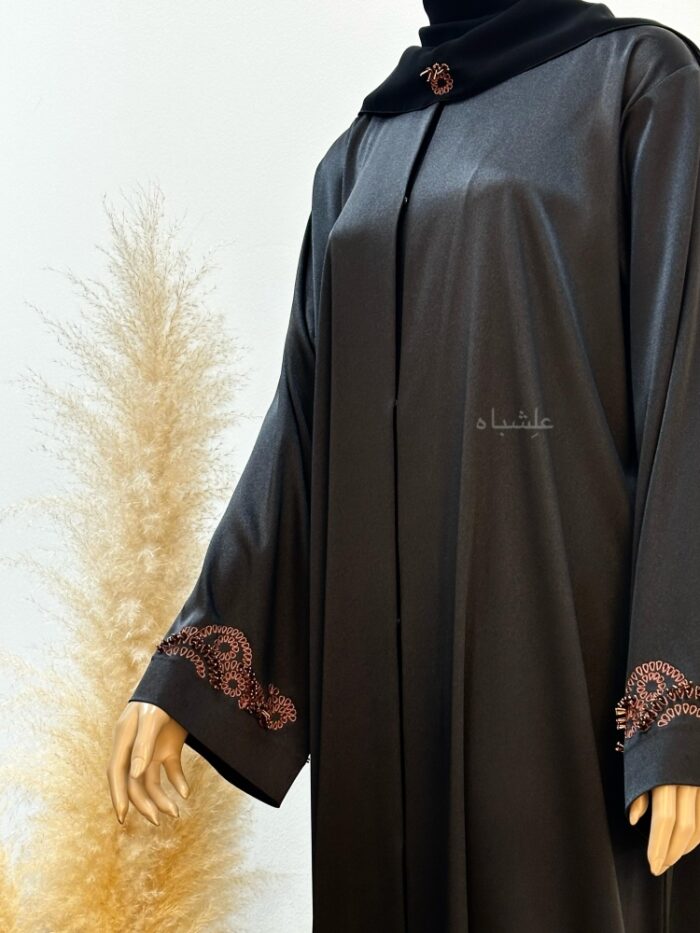 Front close up view of abaya with sheila from a slightly side angle