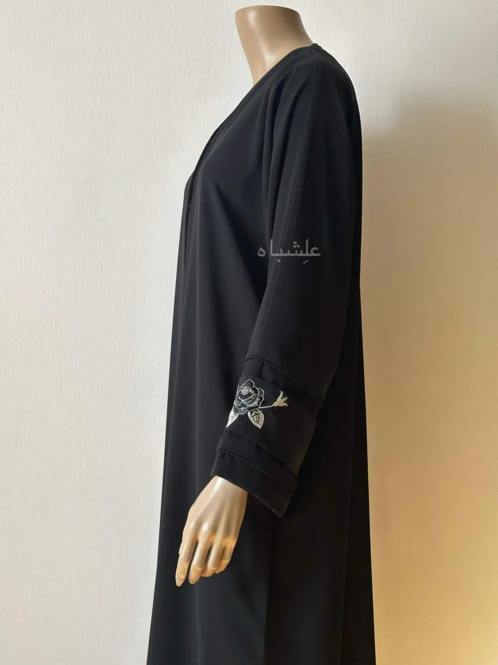 Side view showing handwork on sleeves