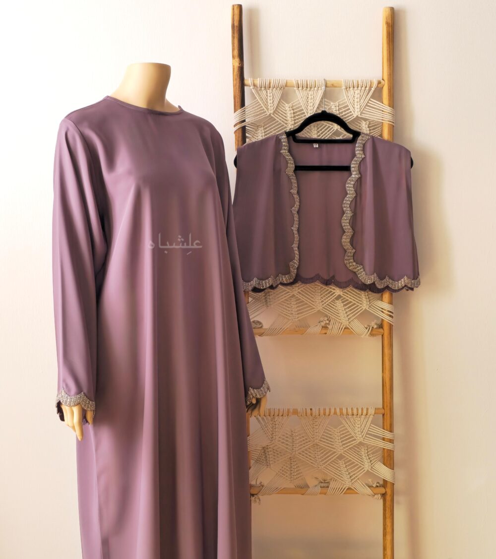 Abaya with vest on