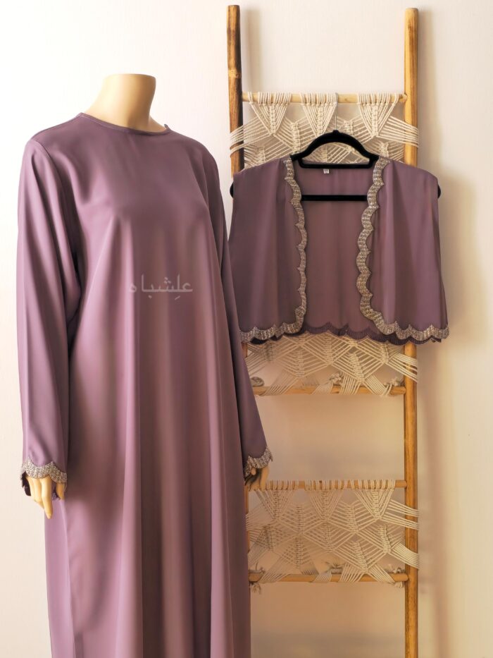 Abaya with vest on