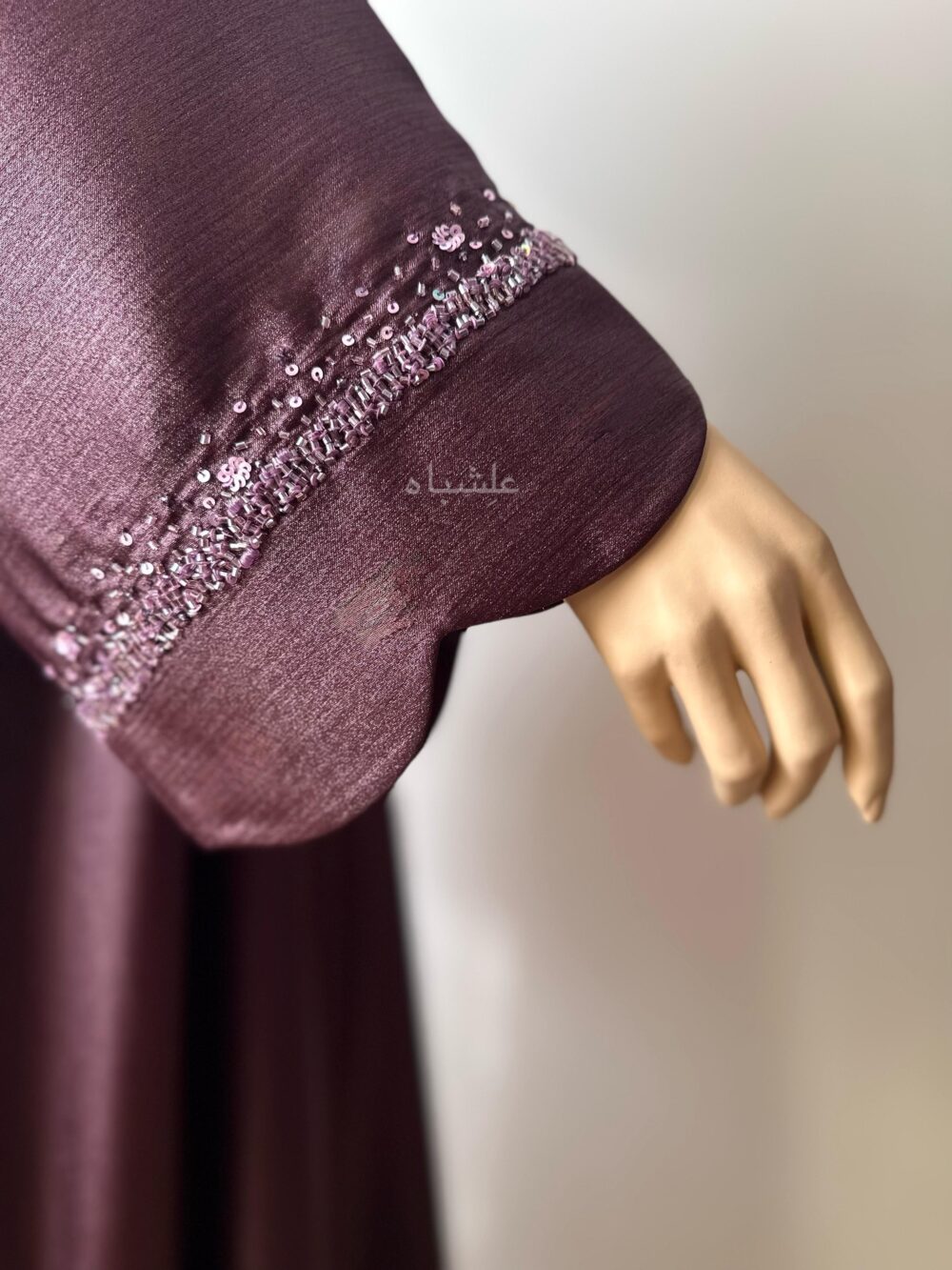 Close up views of sleeves handwork