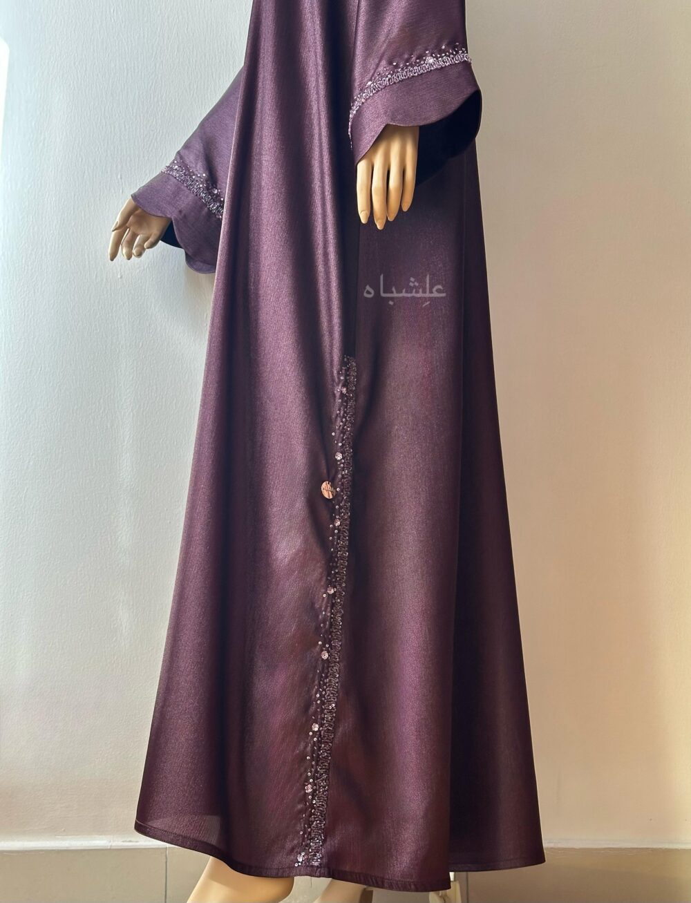 Side view of handwork on bottom part of the abaya