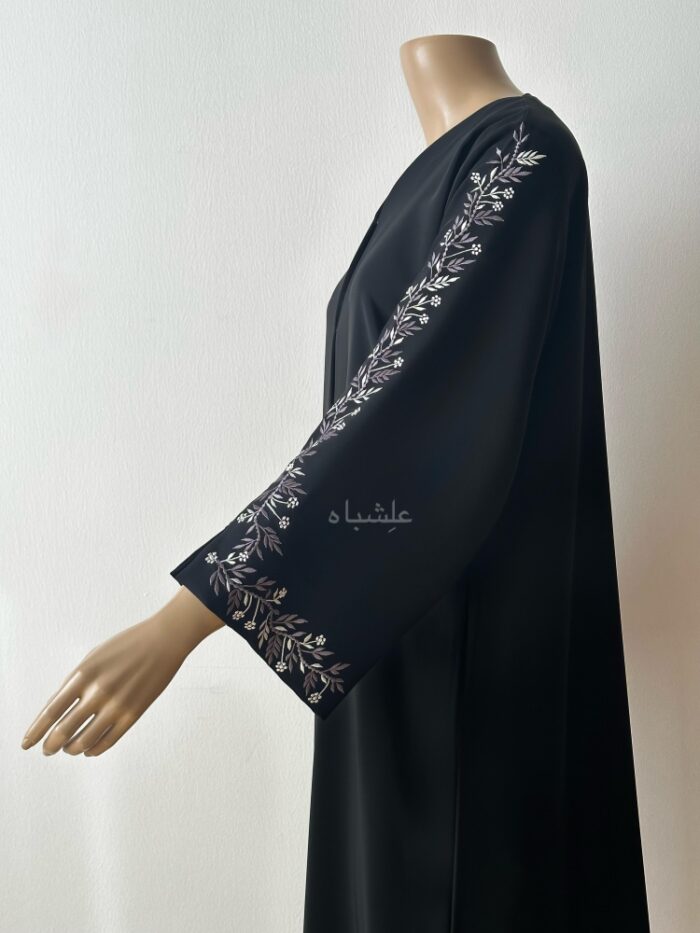 Showing the work on side of abaya sleeves