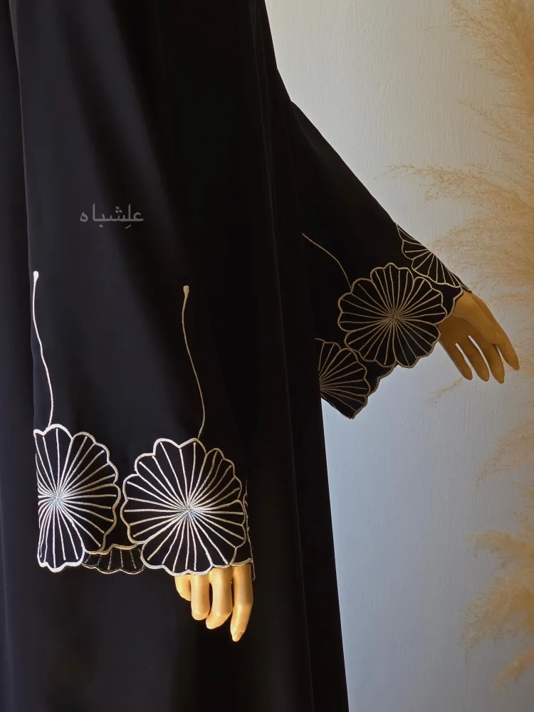 Side of both sleeves showing the exequisite embroidery work on sleeves