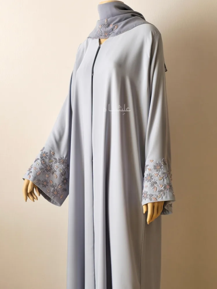 Close up view of abaya with sheila pastel blue color