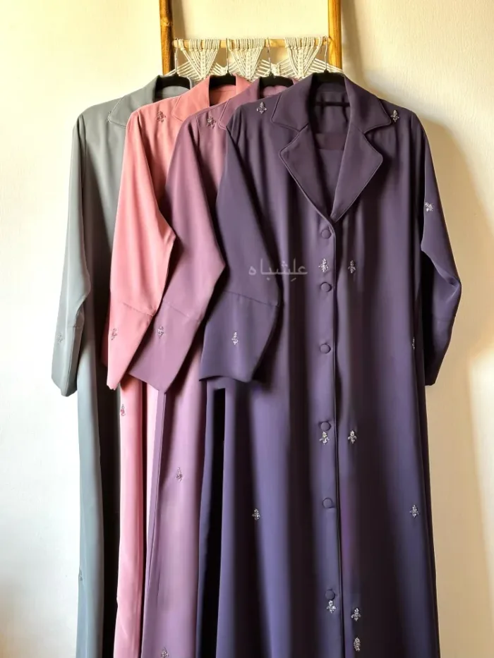 Front view photo of 4 abayas in a ladder