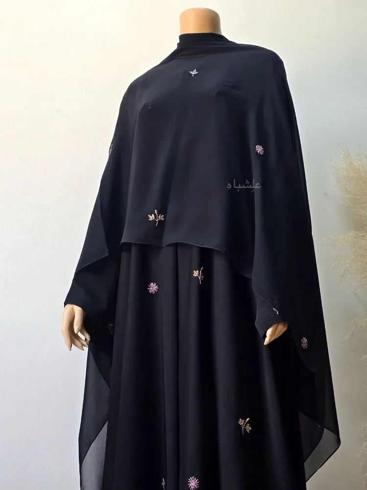 Front view of abaya with sheila spread all aover