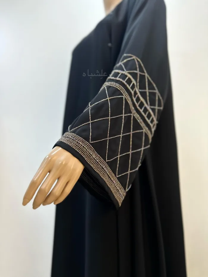 Close up view of sleeves showing the handwork in detail