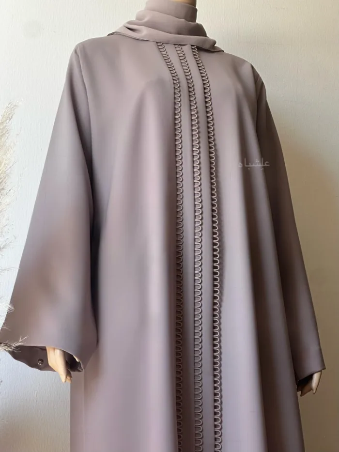 Front close-up view of abaya from down angle