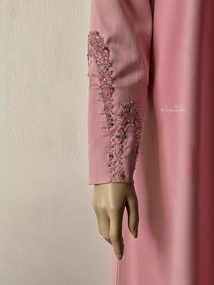 Roselight Cascade Abaya – Alishbah Abaya 5 Close up view of the sleeves only, showing the arc work on the sleeves