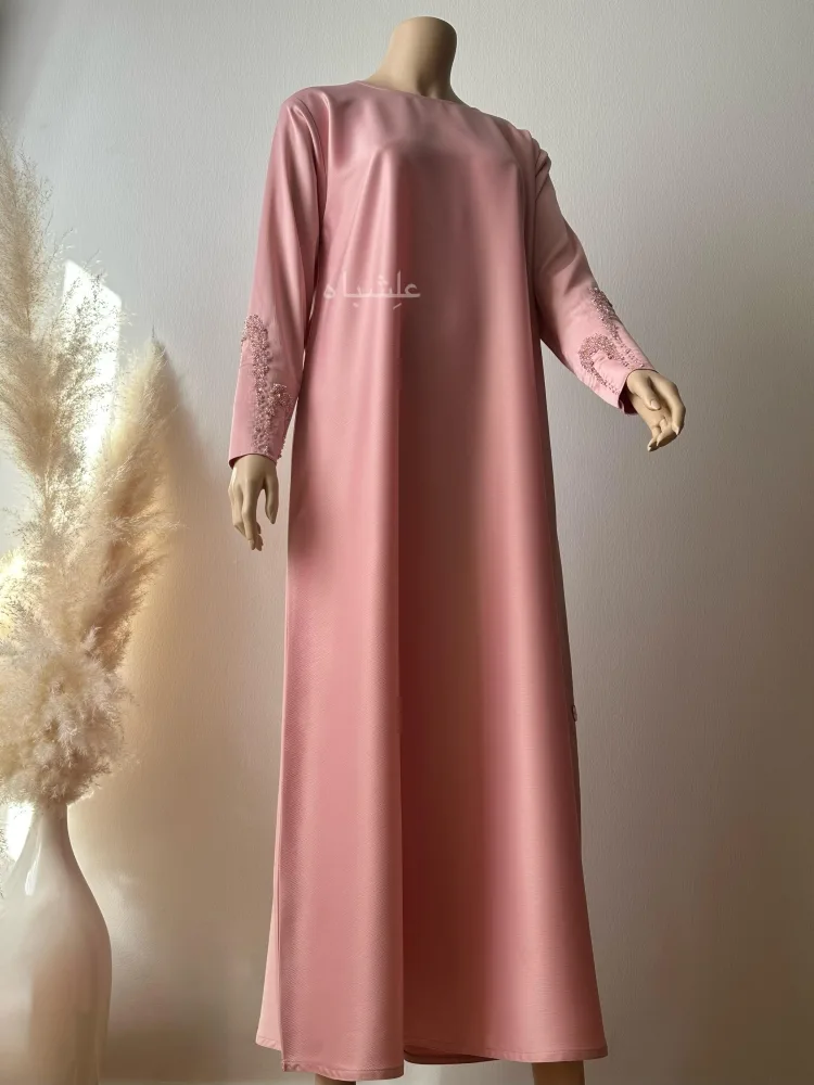Roselight Cascade Abaya – Alishbah Abaya 9 Front full view of inner abaya with one hand raised higher
