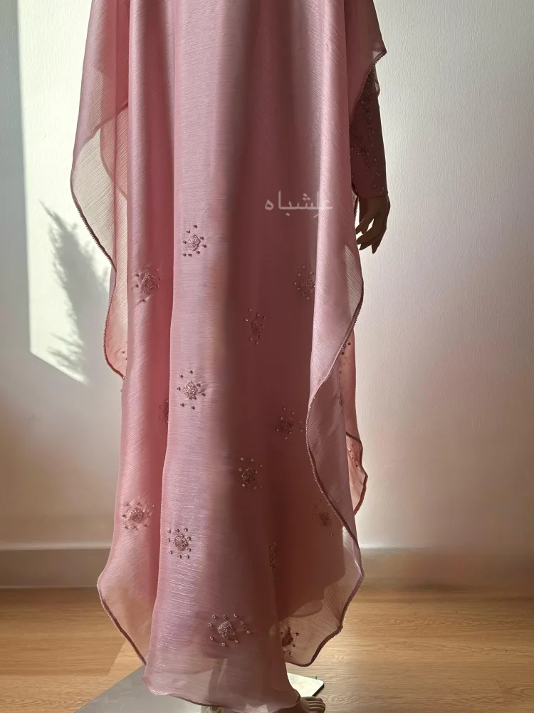 Roselight Cascade Abaya – Alishbah Abaya 10 Close up view of bottom part of the abaya showing the work on abaya bottom