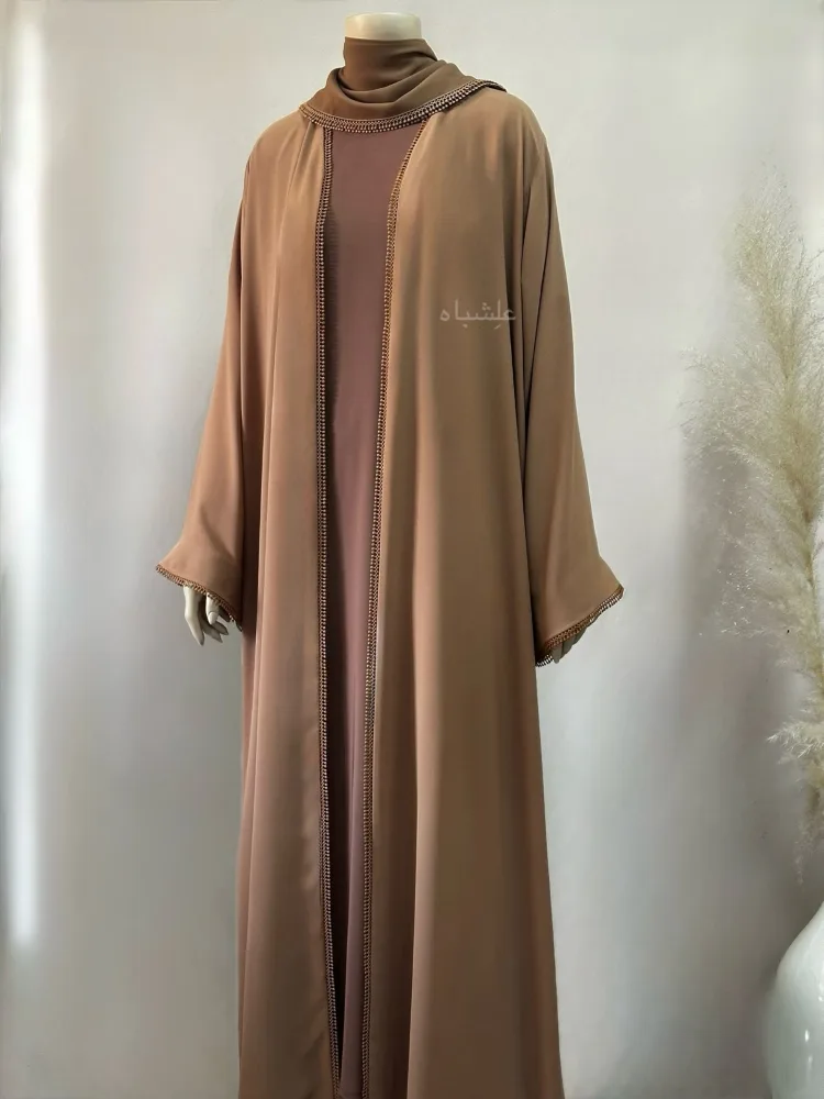 Desert Calm Abaya – A Grounded Choice for the Thoughtful Woman 4 Front view of abaya and sheila showing the Nida premium inner