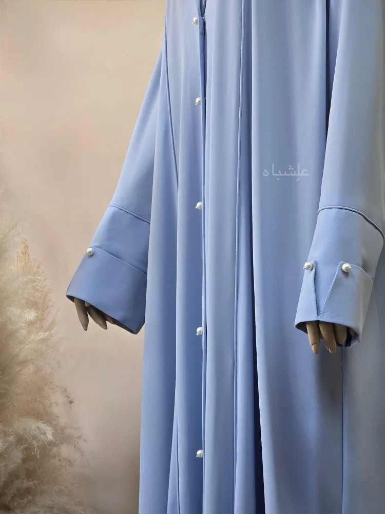 Blue Dusk – A Quiet Pause Between Light and Prayer 2 Close up view of both sleeves