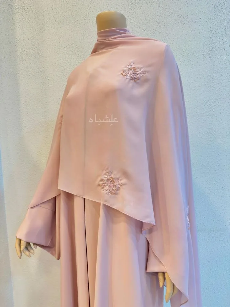 Blush Whisper — Nida Premium Abaya with Handworked Sheila 4 Front view of the abaya with sheila spread all over the front showing the handwork from a different angle