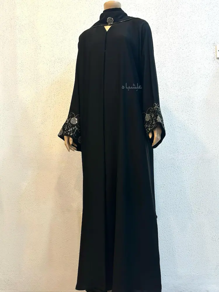 Noor Al-Sukut Handcrafted Minimal Abaya 4 Noor Al-Sukut Abaya-front-view