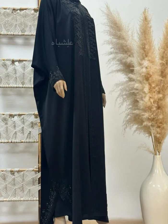 "Close-up of Tranquil Elegance Abaya from Alishbah, showcasing delicate handwork on Zoom New fabric."