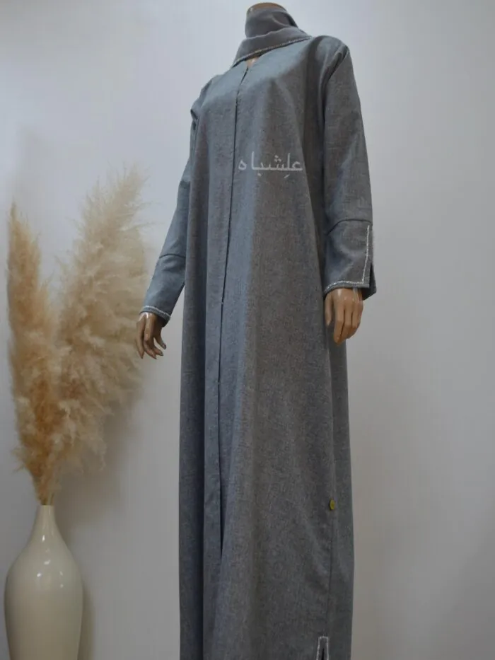 **"Full view of the Lunar Elegance Abaya by Alishbah, featuring the luxurious Taiwan linen fabric, intricate handwork on the sleeves, and a matching soft chiffon Sheila. The complete ensemble exemplifies sophisticated, timeless elegance."**