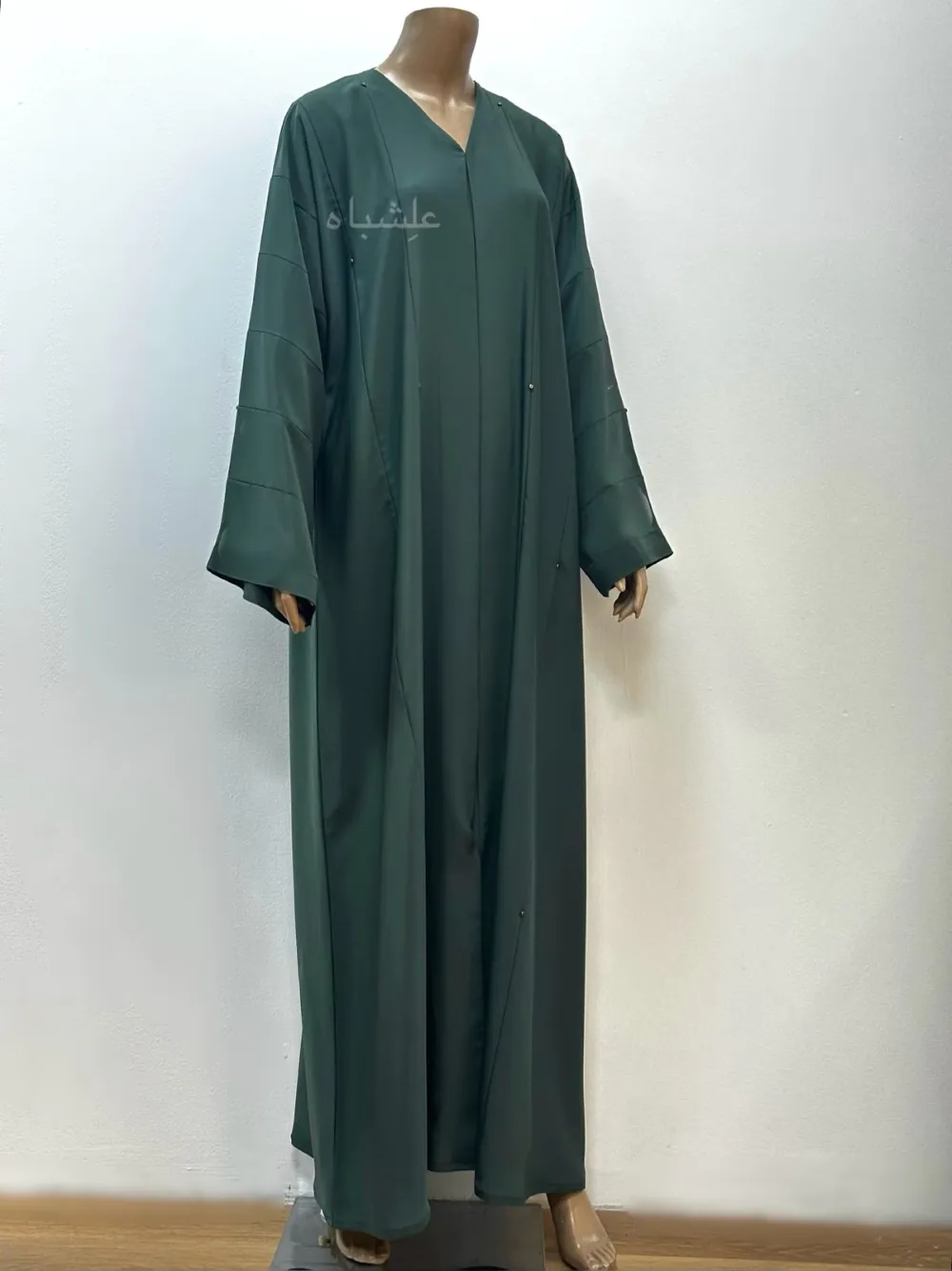 Full view of Nida Premium Green Handwork Abaya Without sheila featuring intricate metal beads handwork, crafted from high-quality Nida fabric, designed for elegant and versatile wear.