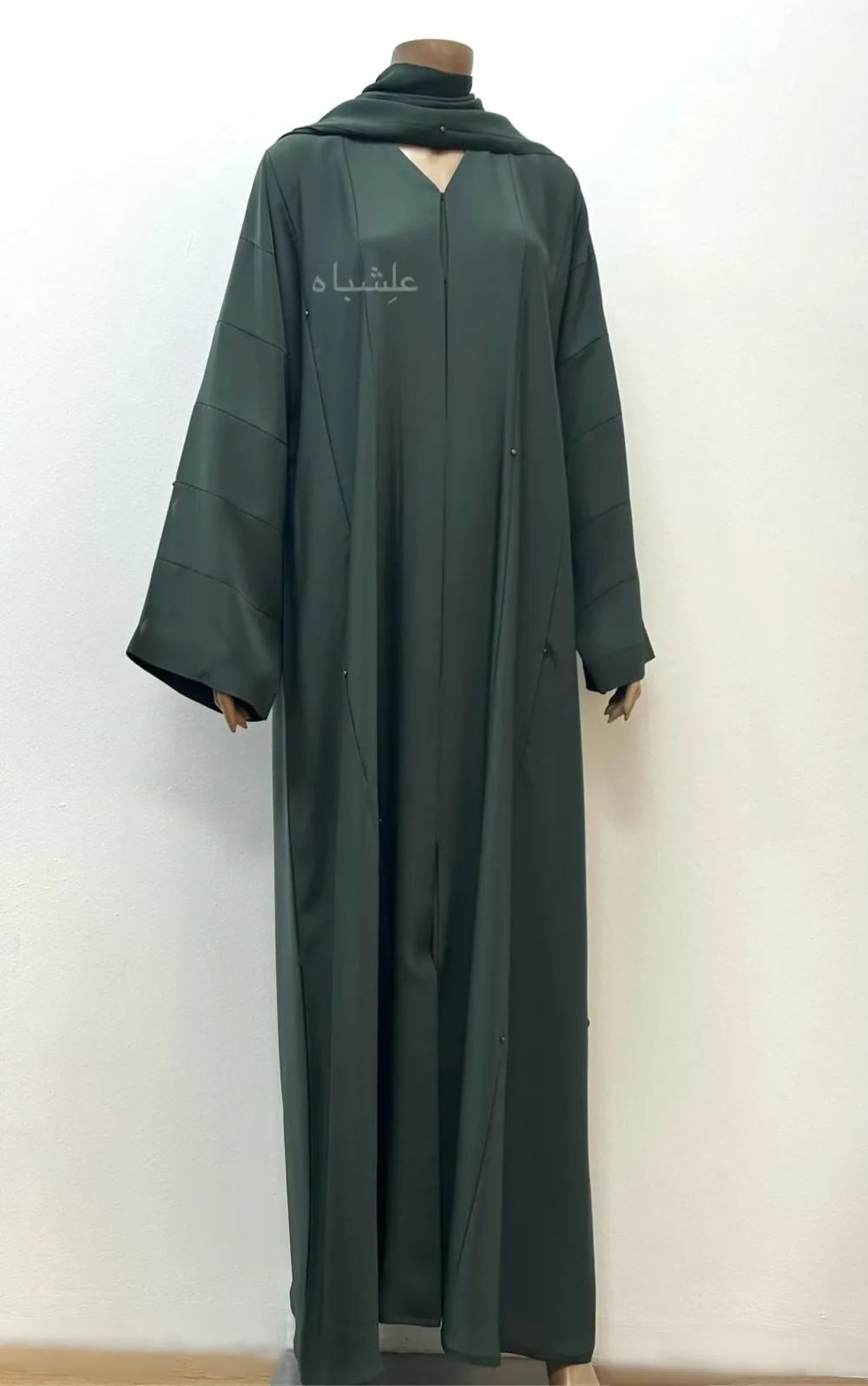 Full view of Nida Premium Green Handwork Abaya featuring intricate metal beads handwork, crafted from high-quality Nida fabric, designed for elegant and versatile wear.