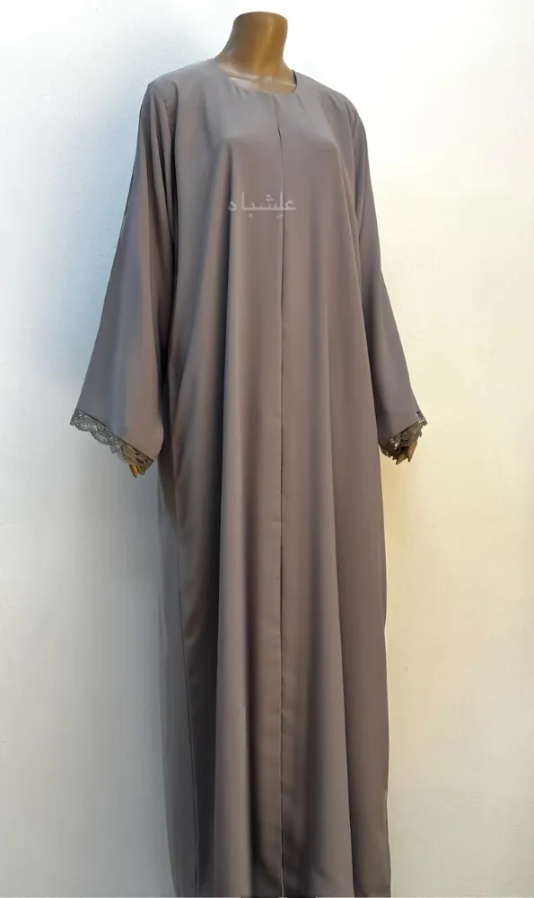 "Front view of the Lace Whisper Abaya showcasing lace-trimmed sleeves and smooth Nida premium fabric."