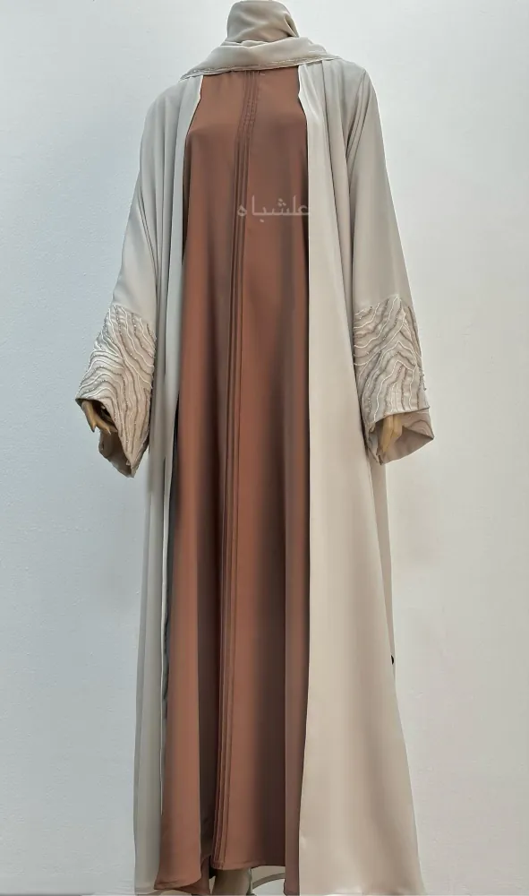 "Front full view of Radiant Harmony Abaya from an alternate angle, highlighting the two-tone design and elegant sheila drape."